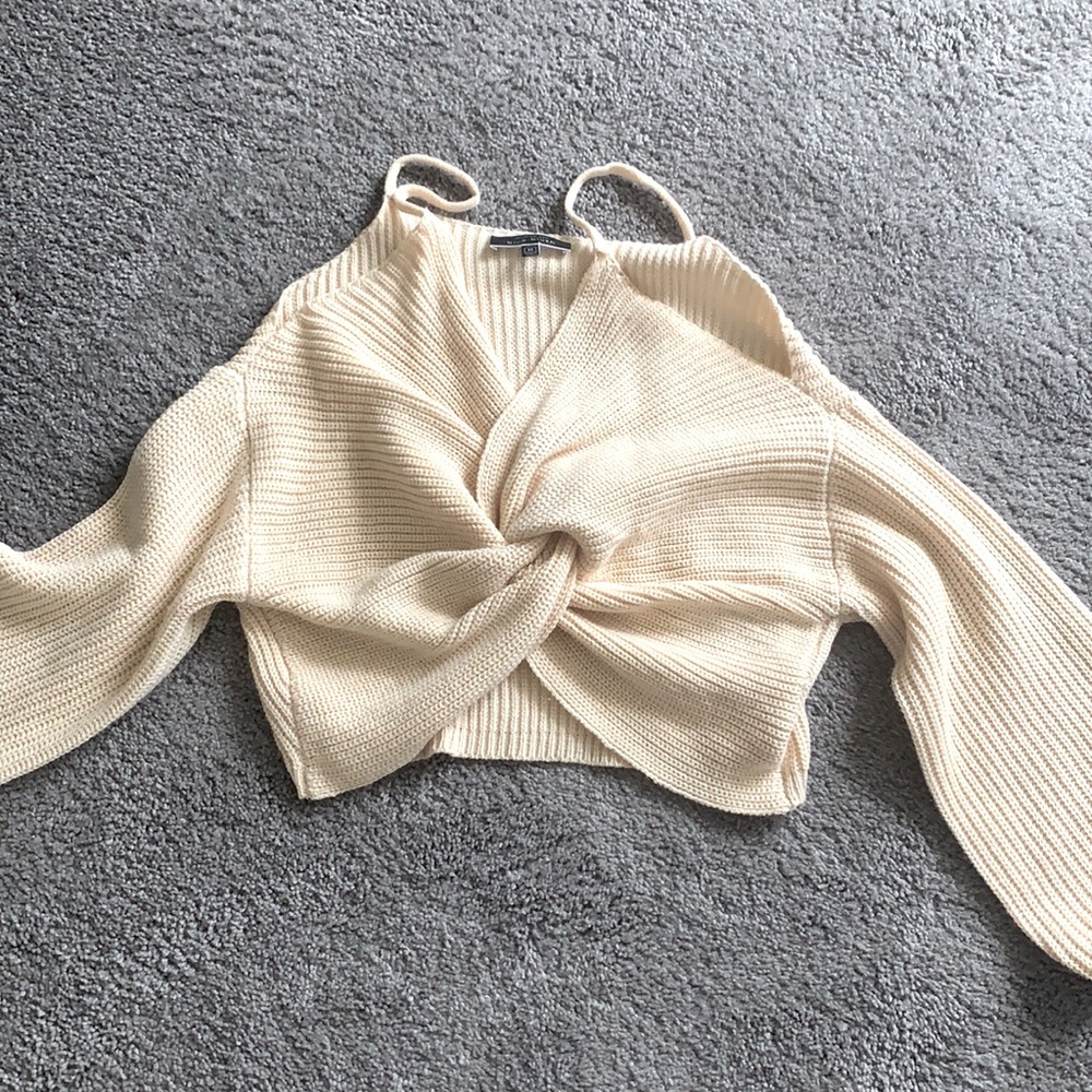 Sweater with knot in front